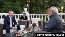 Indian Prime Minister Narendra Modi (right) meets with Russian President Vladimir Putin in Moscow on July 7.