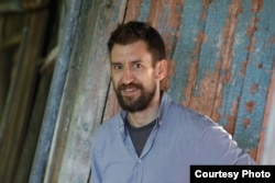 Джошуа Кучэра