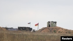 Armenia - An Armenian border guard post next to the Azerbaijani border guard post is seen from the village of Tegh in Syunik, September 21, 2023.