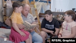 Євген Межевой разом із дітьми