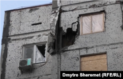 Последствия российских обстрелов, микрорайон Корабел (Остров) в Херсоне, декабрь 2022 года