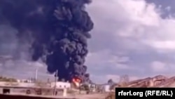 Пожар на Феодосийском нефтеперевалочном терминале после украинского удара в ночь на 7 октября 2024 года. Архивное фото, 9 октября 2024 года