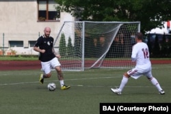 Мікта Мелказёраў падчас гульні ў футбол