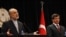 Iranian Foreign Minister Ali Akbar Salehi (left) and his Turkish counterpart, Ahmet Davutoglu, attend a news conference in Ankara on October 21.