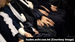 Судді ЄСПЛ у мантіях