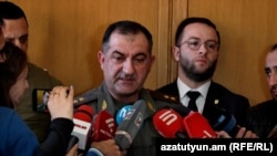 Armenia - Lieutenant-General Eduard Asrian speaks to journalists.