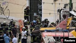 Рятувальники на місці трагедії в Лісабоні, 3 вересня 2025 року