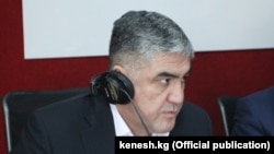 Курсан Асанов.