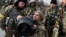 UKRAINE – New members of the Territorial Defence Forces train to operate NLAW anti-tank launcher during military exercises amid Russia's invasion of Ukraine, in Kyiv, March 9, 2022