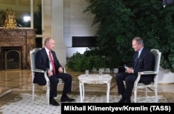 ვლადიმირ პუტინი, არმინ ვოლფი