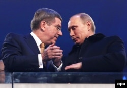 Томас Бах і Володимир Путін на церемонії відкриття Олімпіади в Сочі. 7 лютого 2014 року