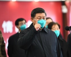 Председатель КНР Си Цзиньпин во время визита в город Ухань, где возник первый очаг коронавирусной инфекции, 10 марта 2020 года