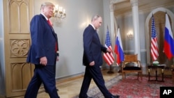 Donald Trump și Vladimir Putin la summitul lor din Finlanda (16 iulie 2018) 