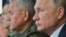 Владимир Путин и министр обороны РФ Сергей Шойгу на учениях "Кавказ-2020" в Астраханской области, 25 сентября 2020 года