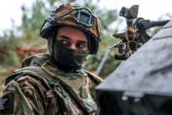 Российский военнослужащий артиллерийской бригады из группировки «Днепр», декабрь 2024 года