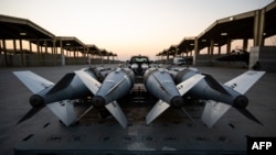 Фотографија објавена од американската војска на 19 декември, направена на неидентификувана локација на 18 декември, на која се гледа како војската се подготвува за напади во Сирија 