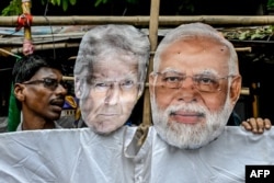 Протесты в Индии против американских пошлин на индийский импорт